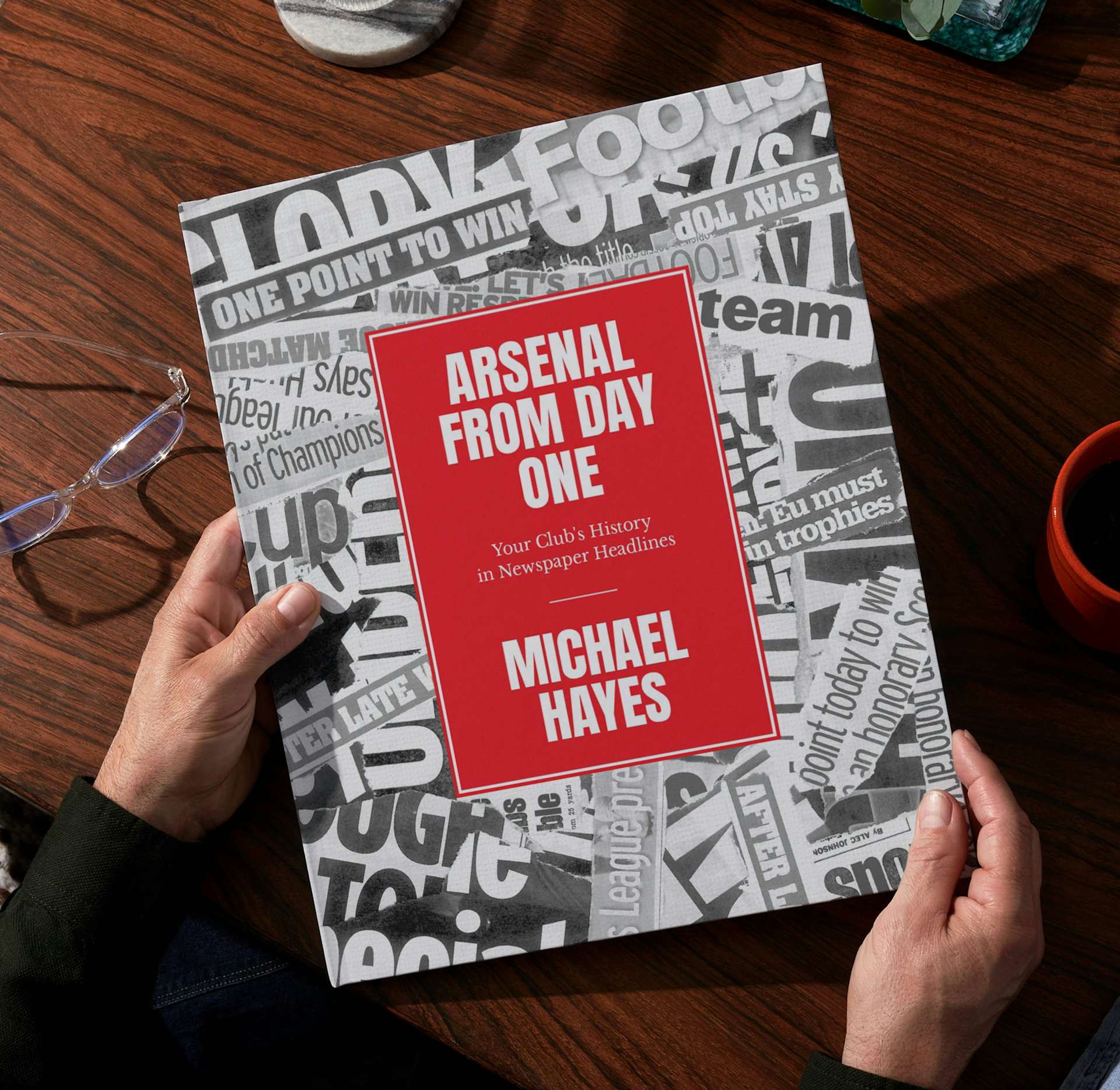 Two hands holding the personalised book