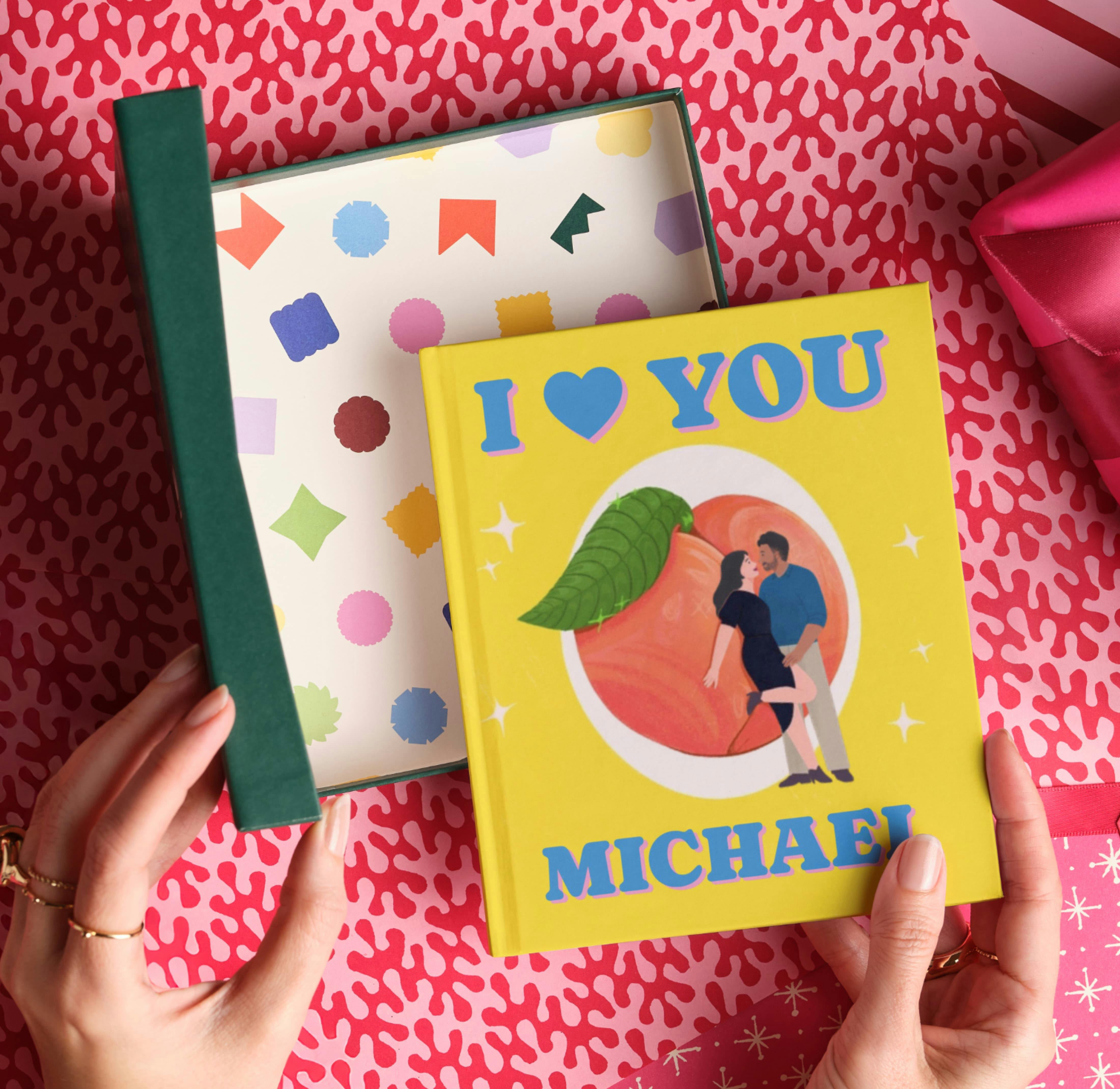 Two hands wrapping the personalised book