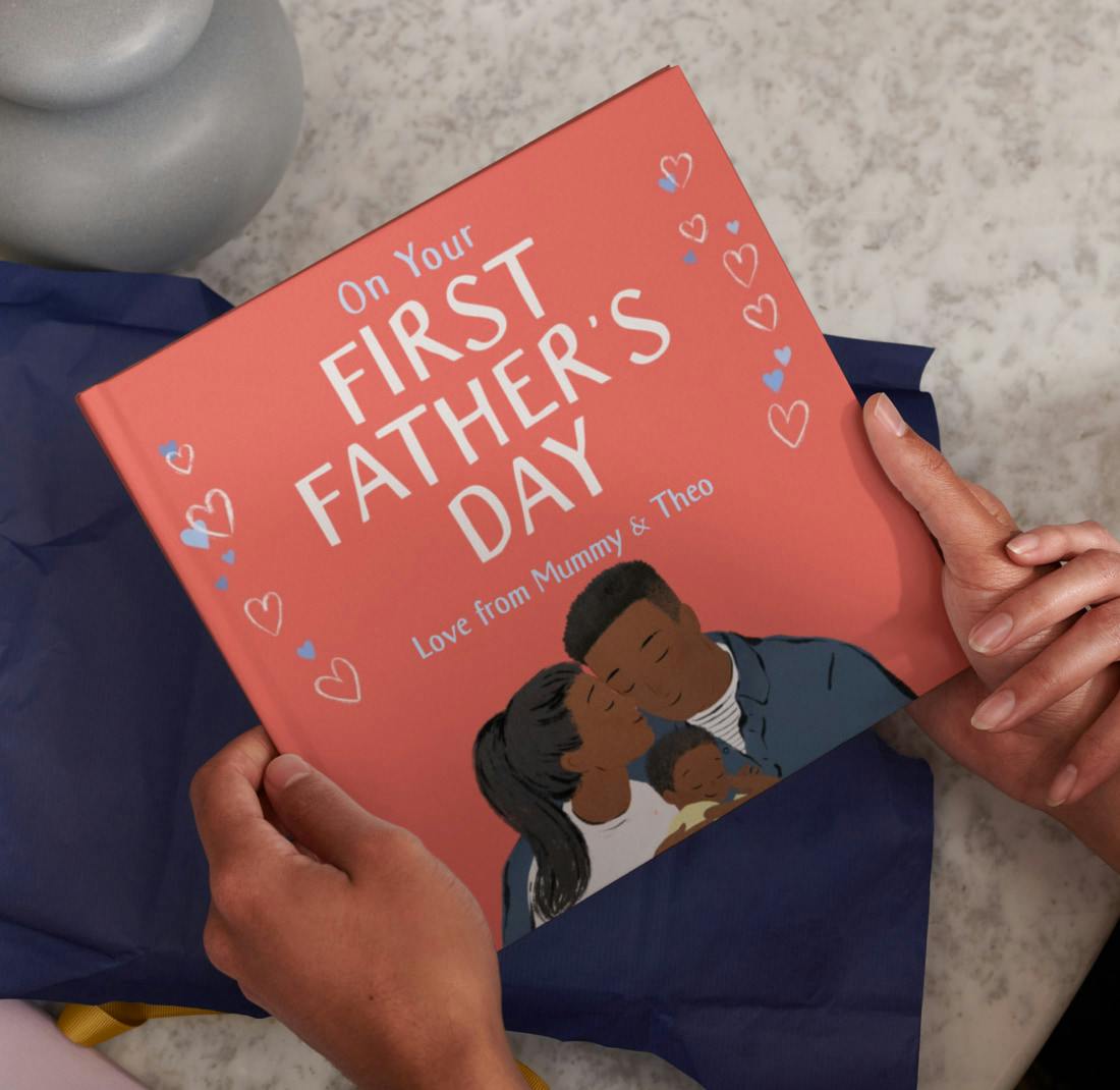 Two hands wrapping the personalised book