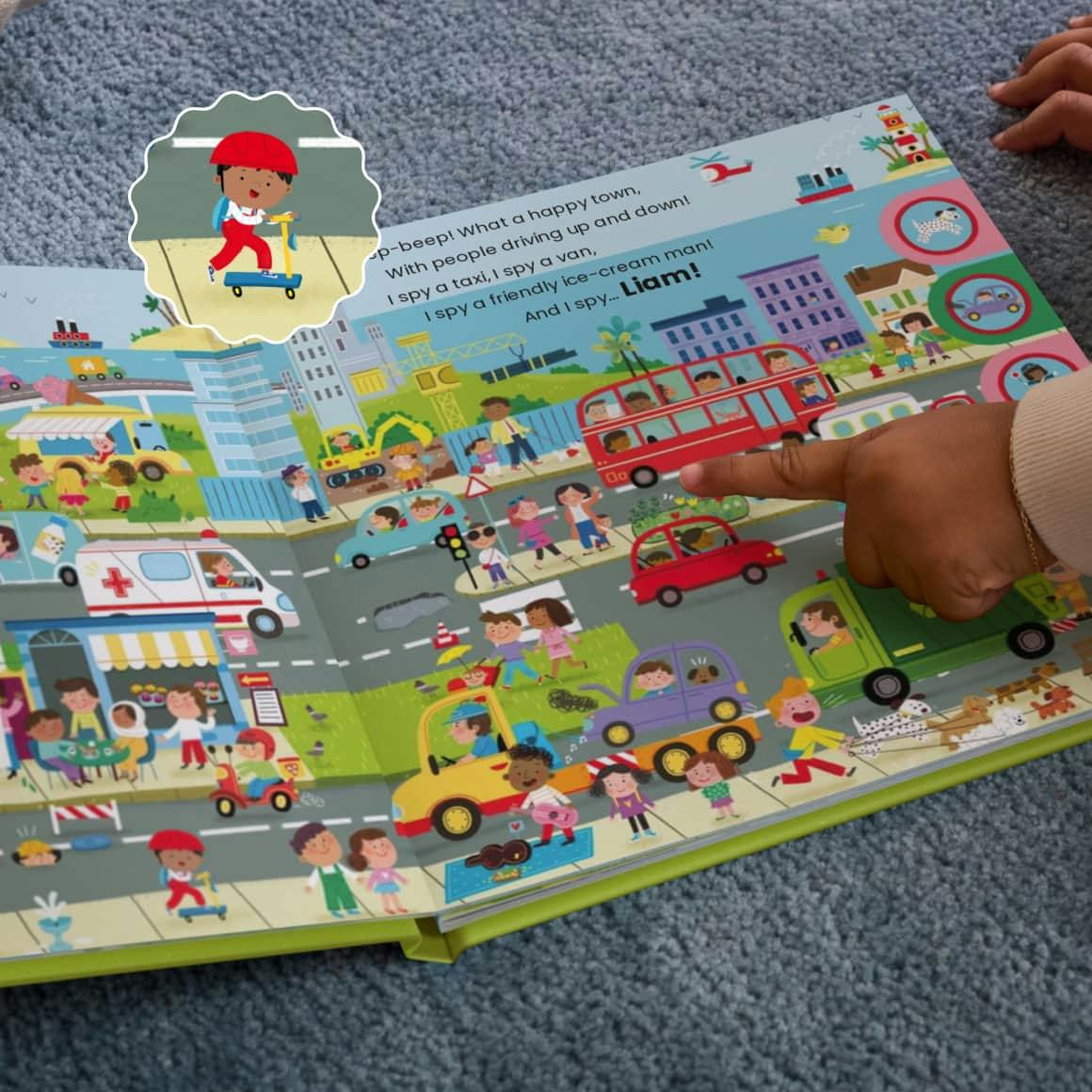 Child pointing to their personalised book
