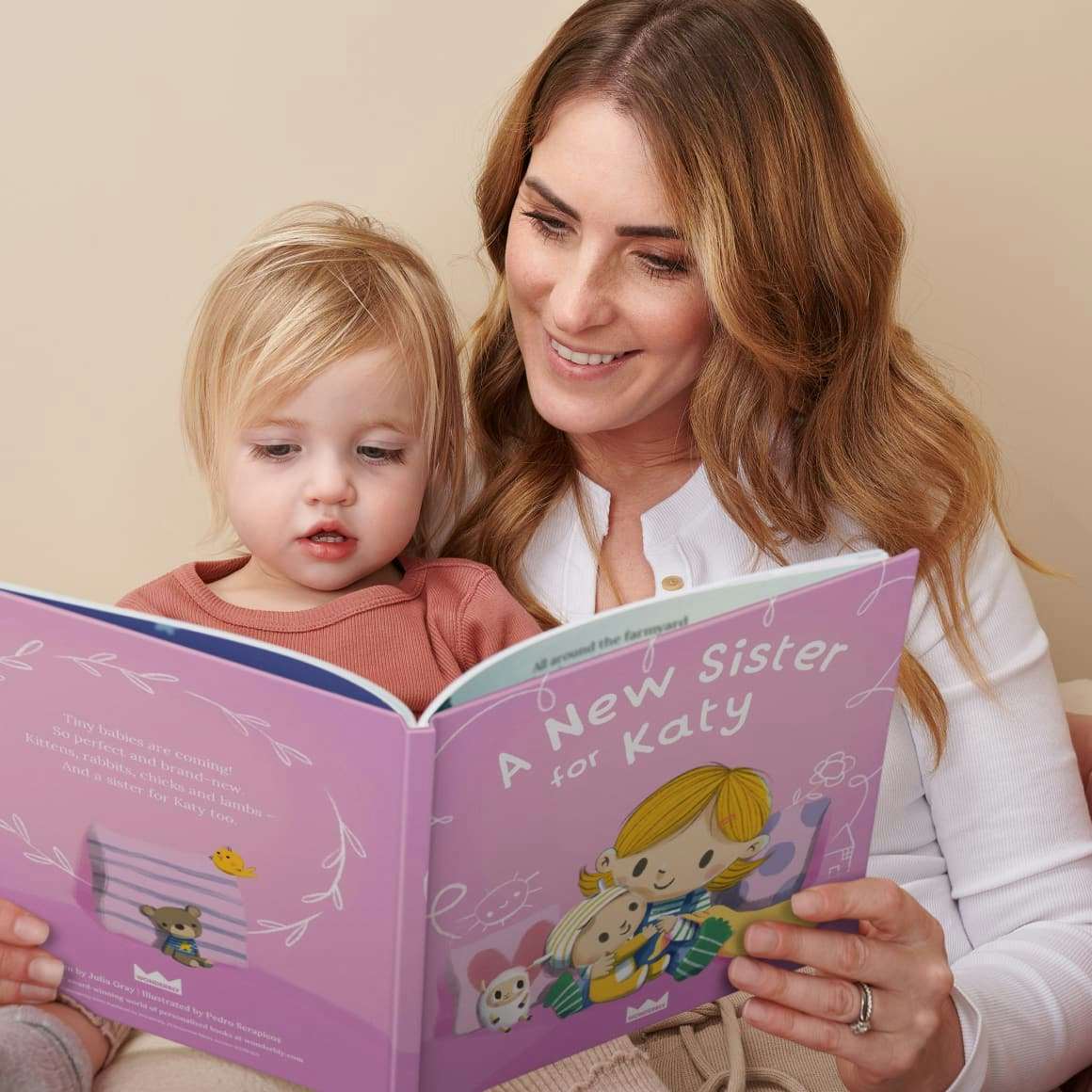A child and mother reading the personalised book