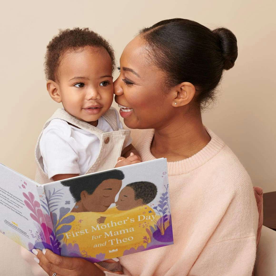 mum and baby reading our first mother's day book
