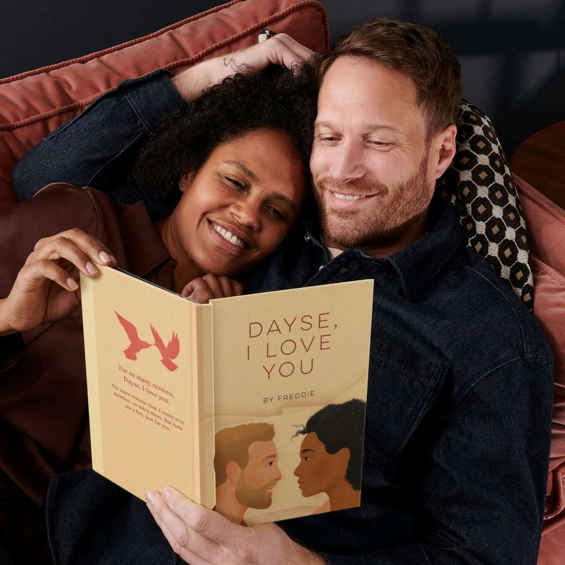 A couple reading the personalised book