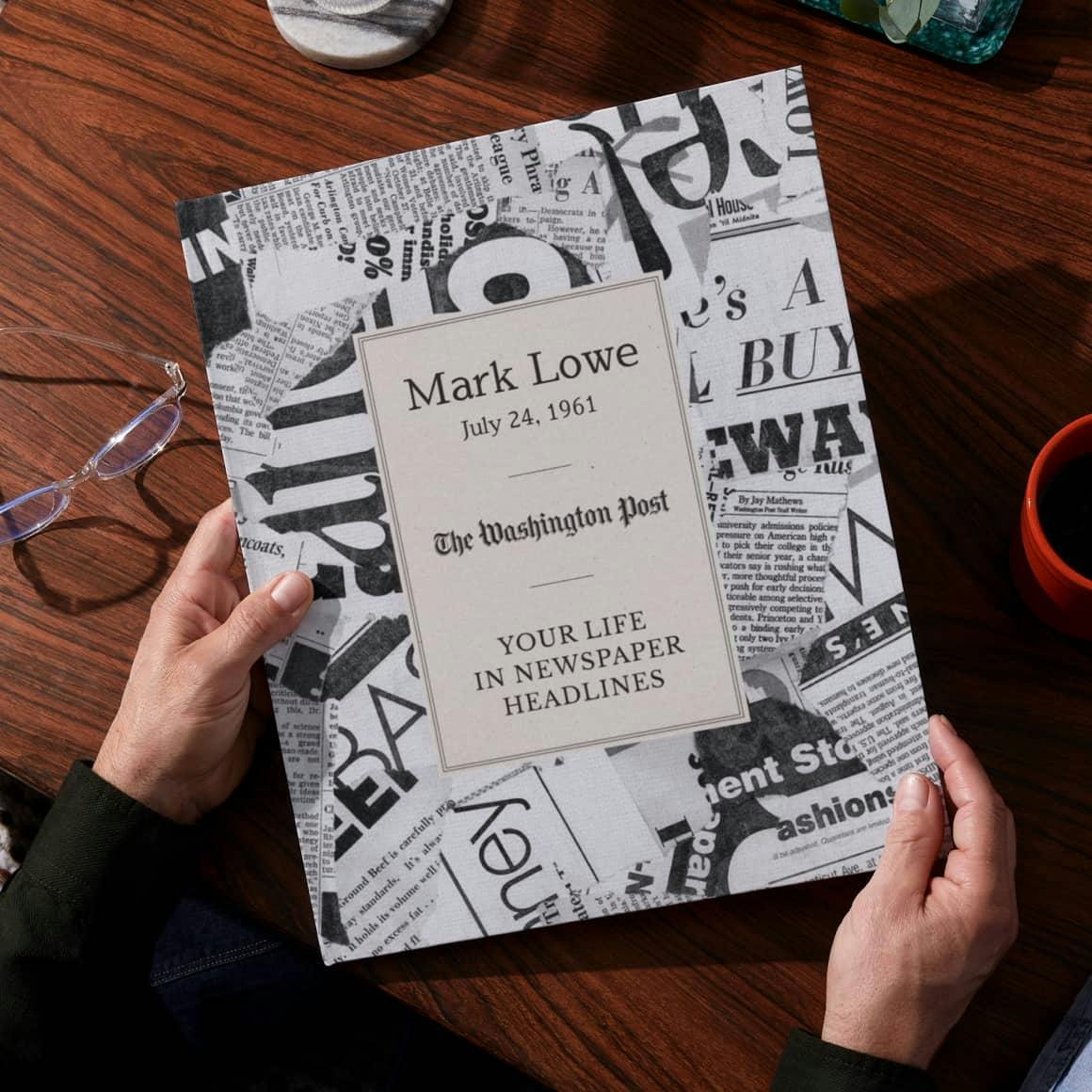 Two hands holding the personalised book