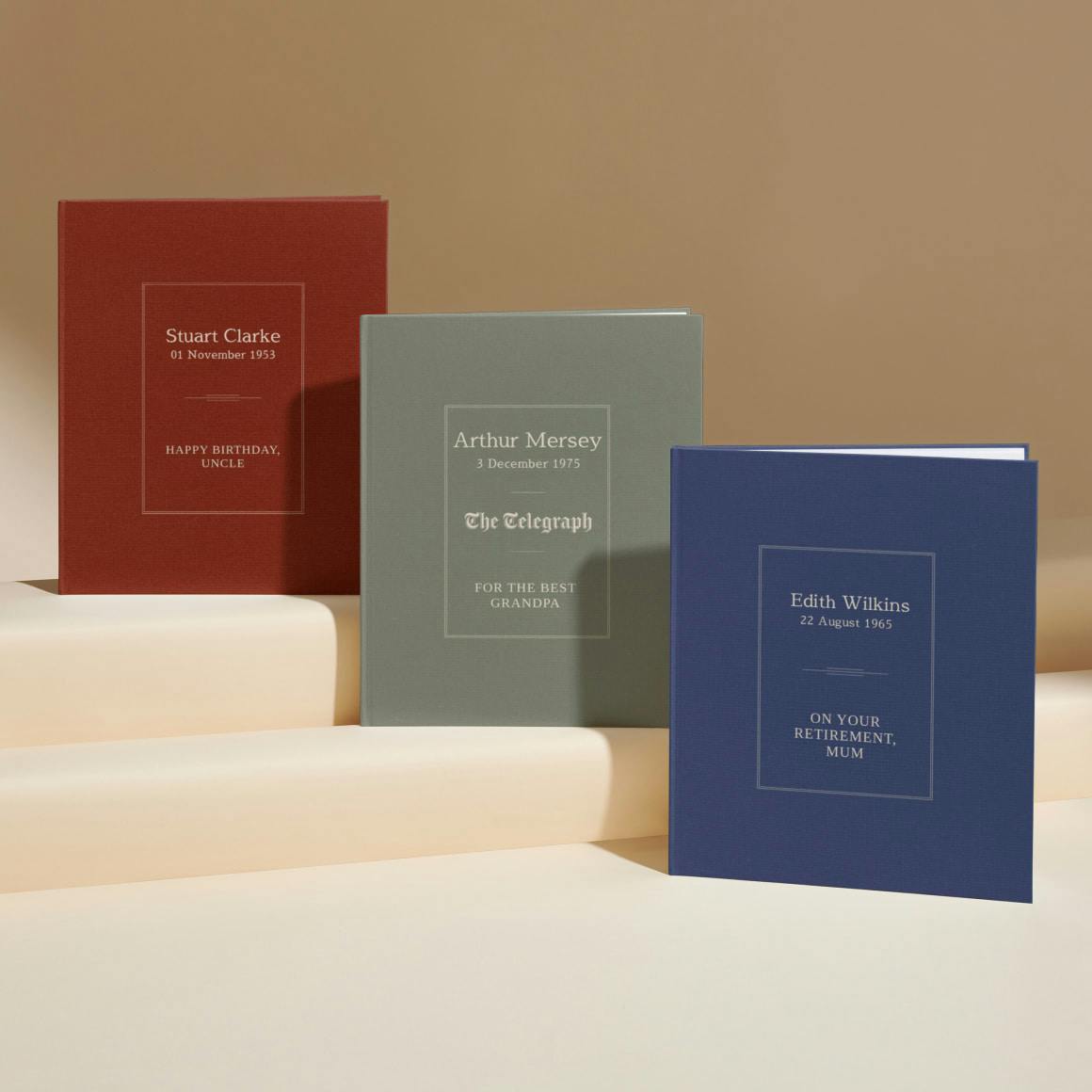 Three personalised book covers