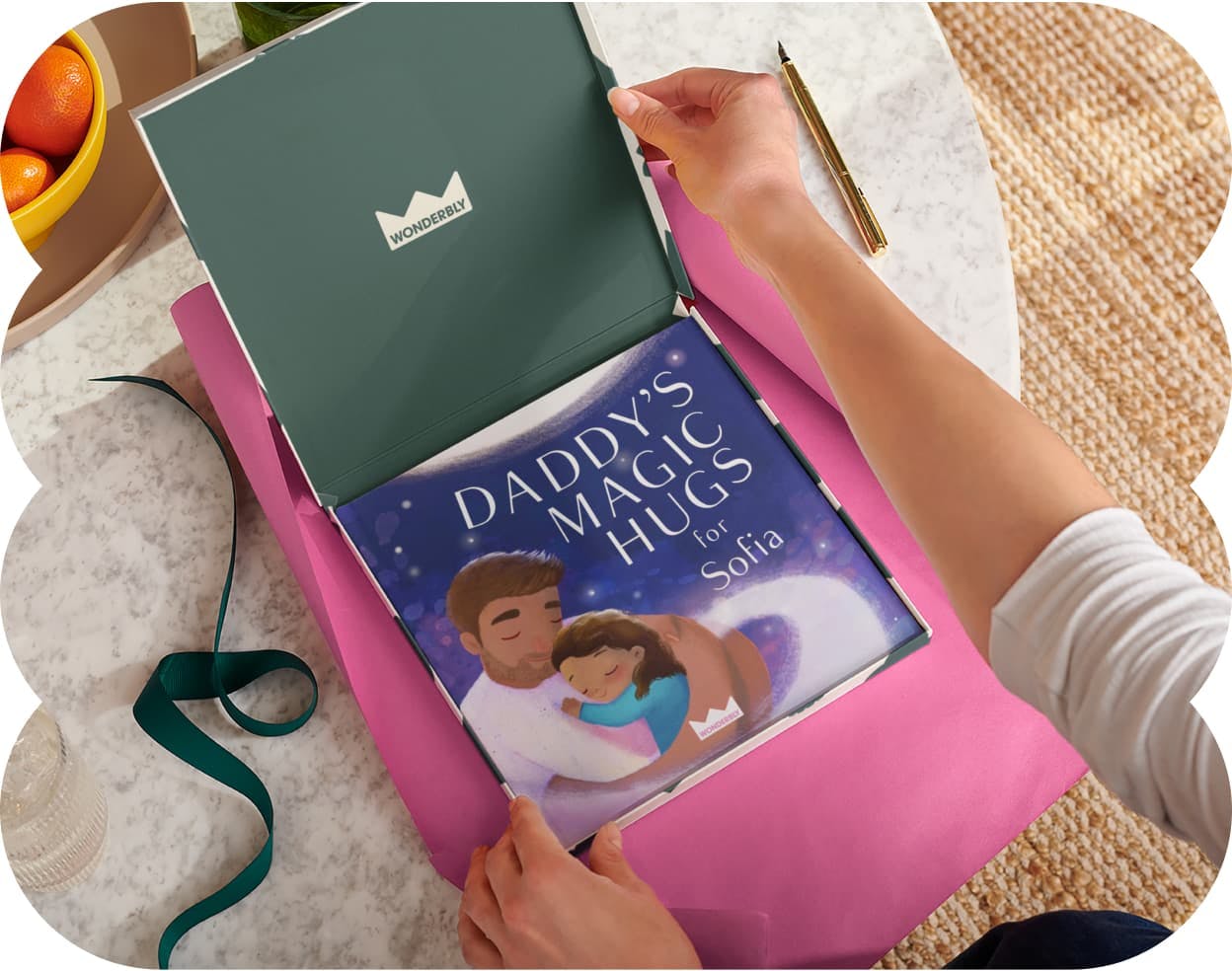 Two hands wrapping the personalised book