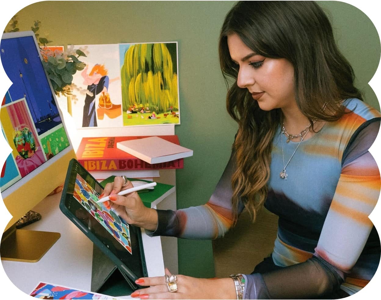 Artist creating designs on a tablet