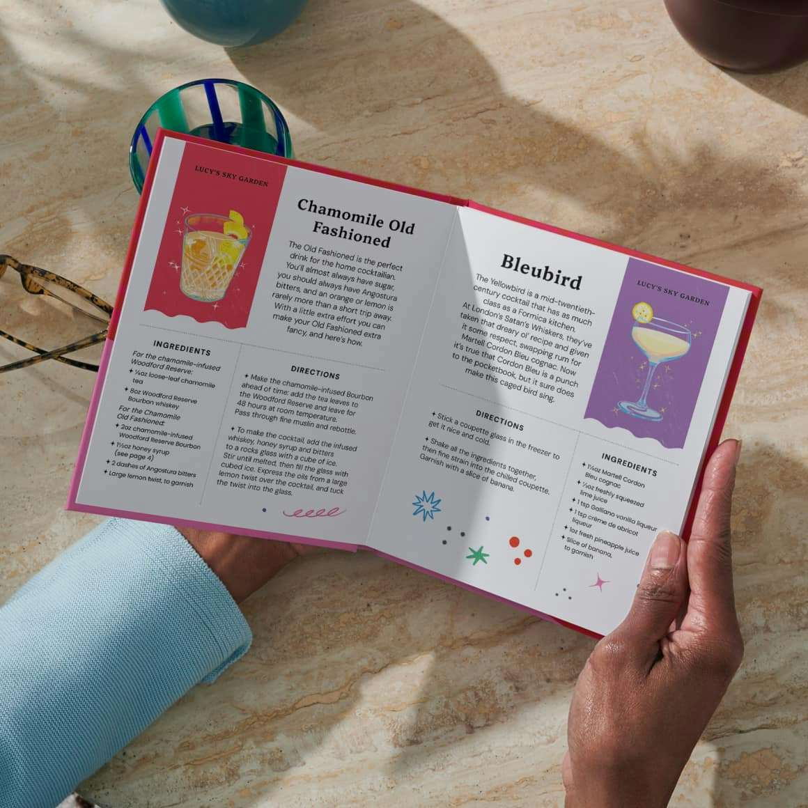 Two hands holding the open personalised book