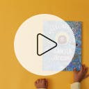 play button on top of first frame of video