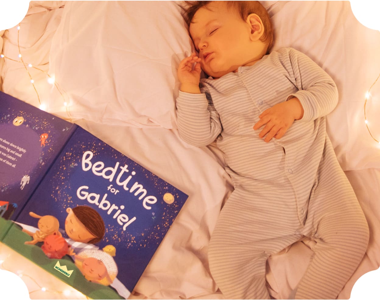 baby sleeping next to book