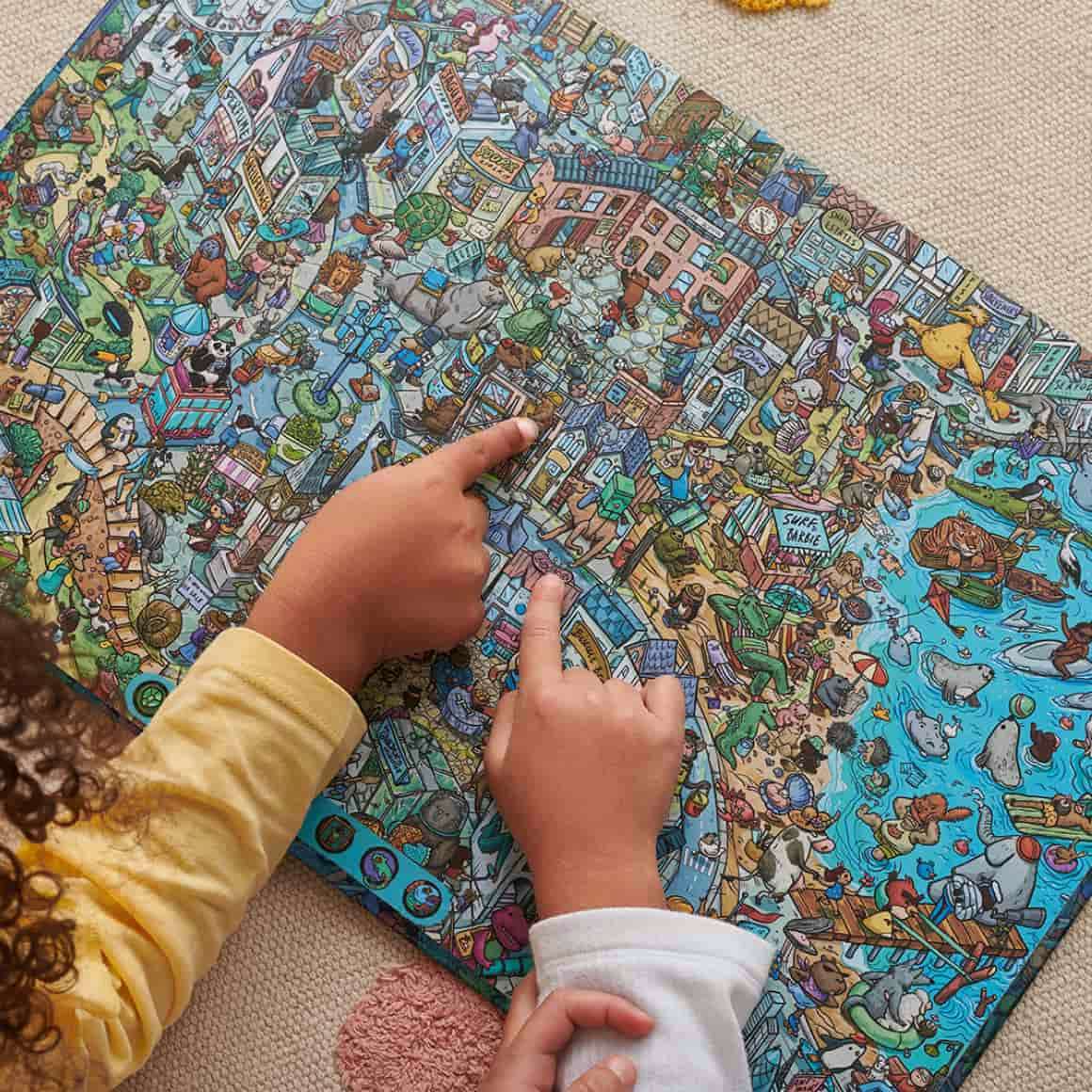 kids pointing at spread