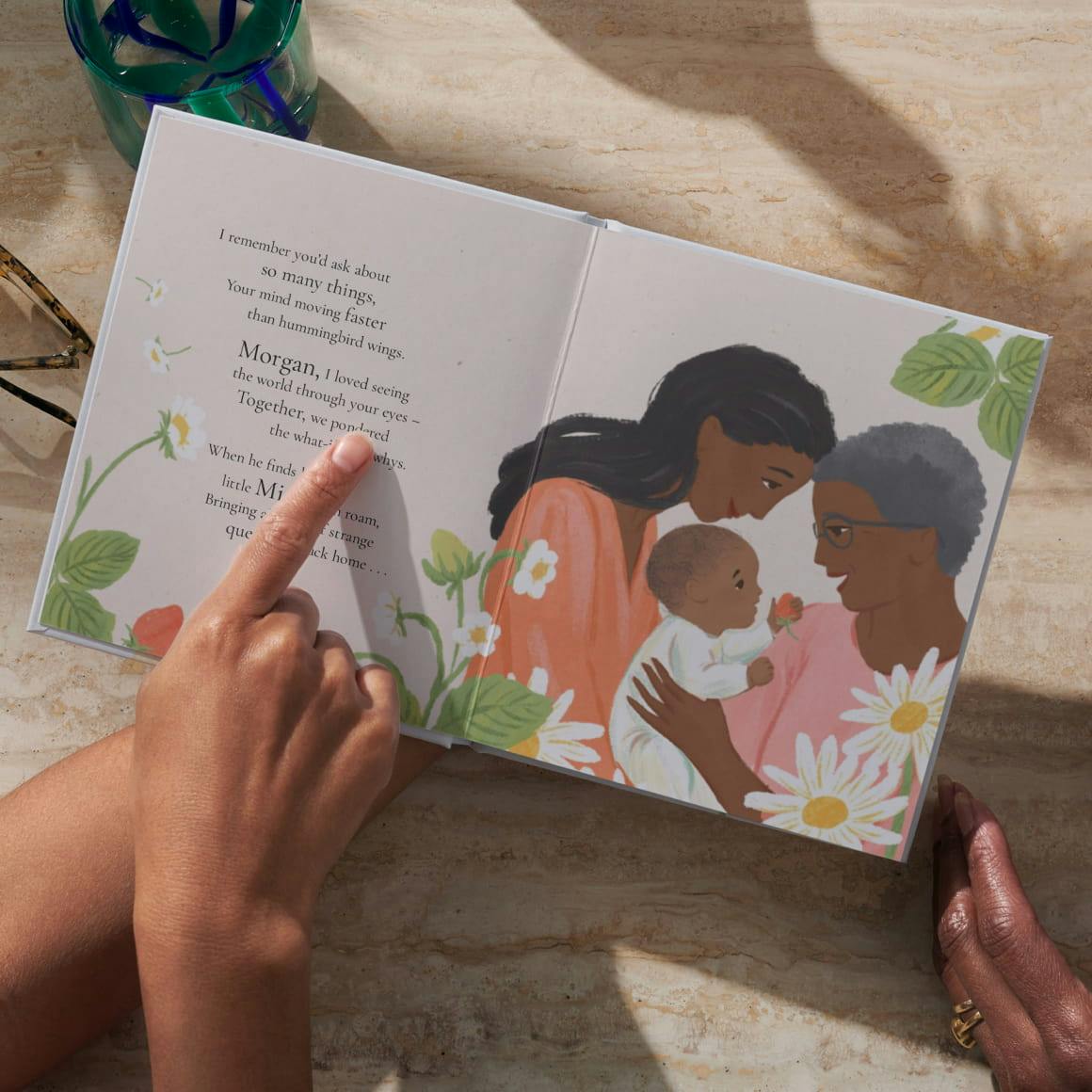 A mother and daughter reading their personalised book