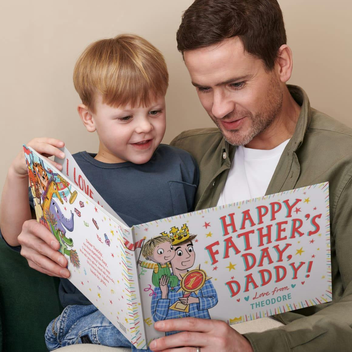A child and father reading the personalised book