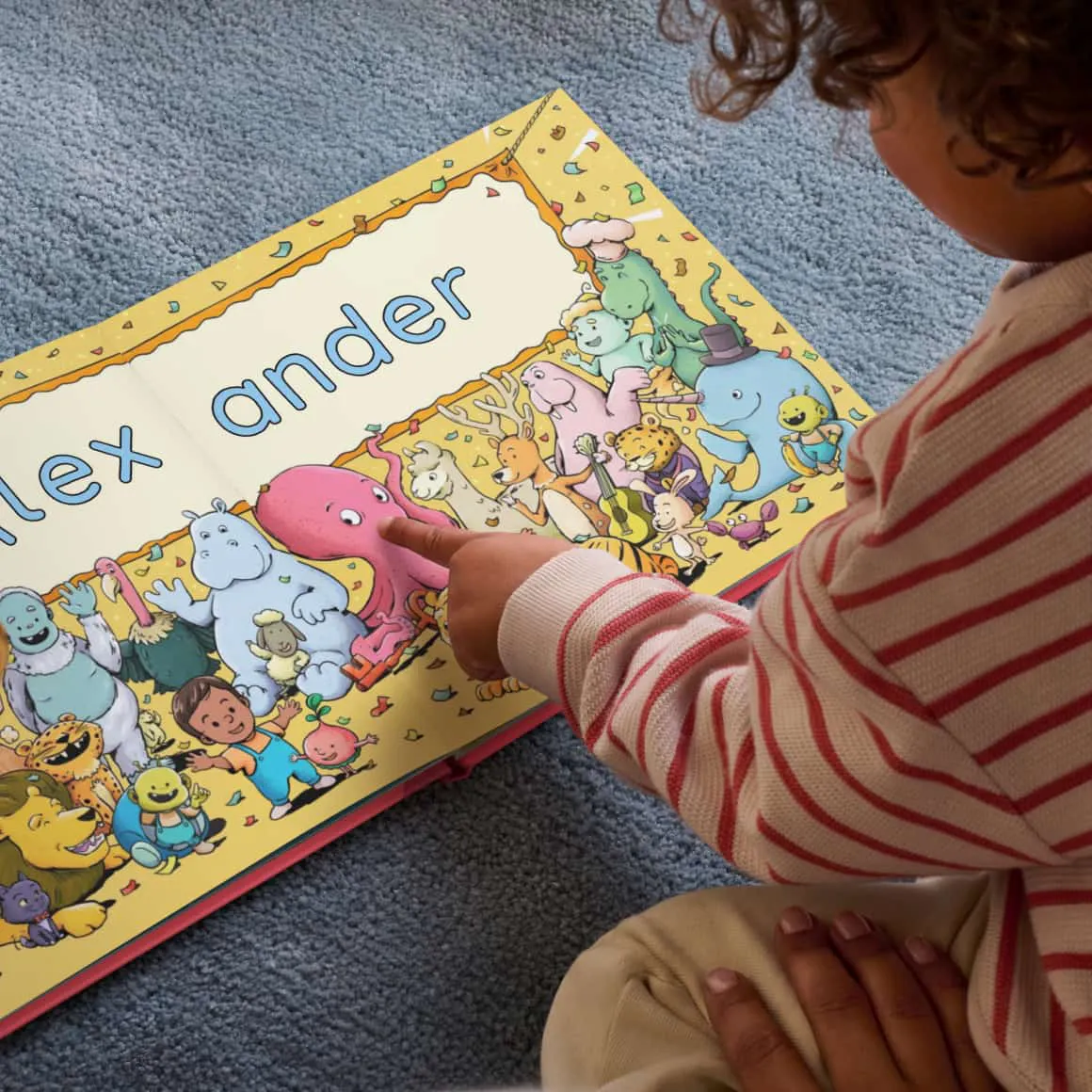kid pointing at book