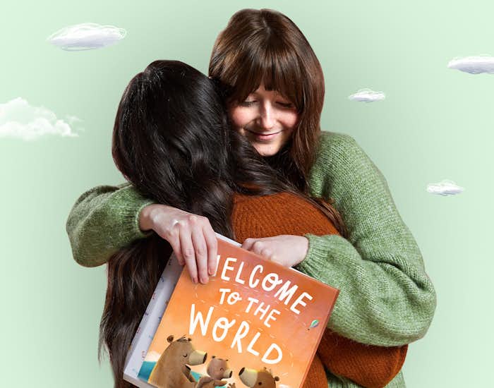 Friends gifting a copy of Welcome To Our World