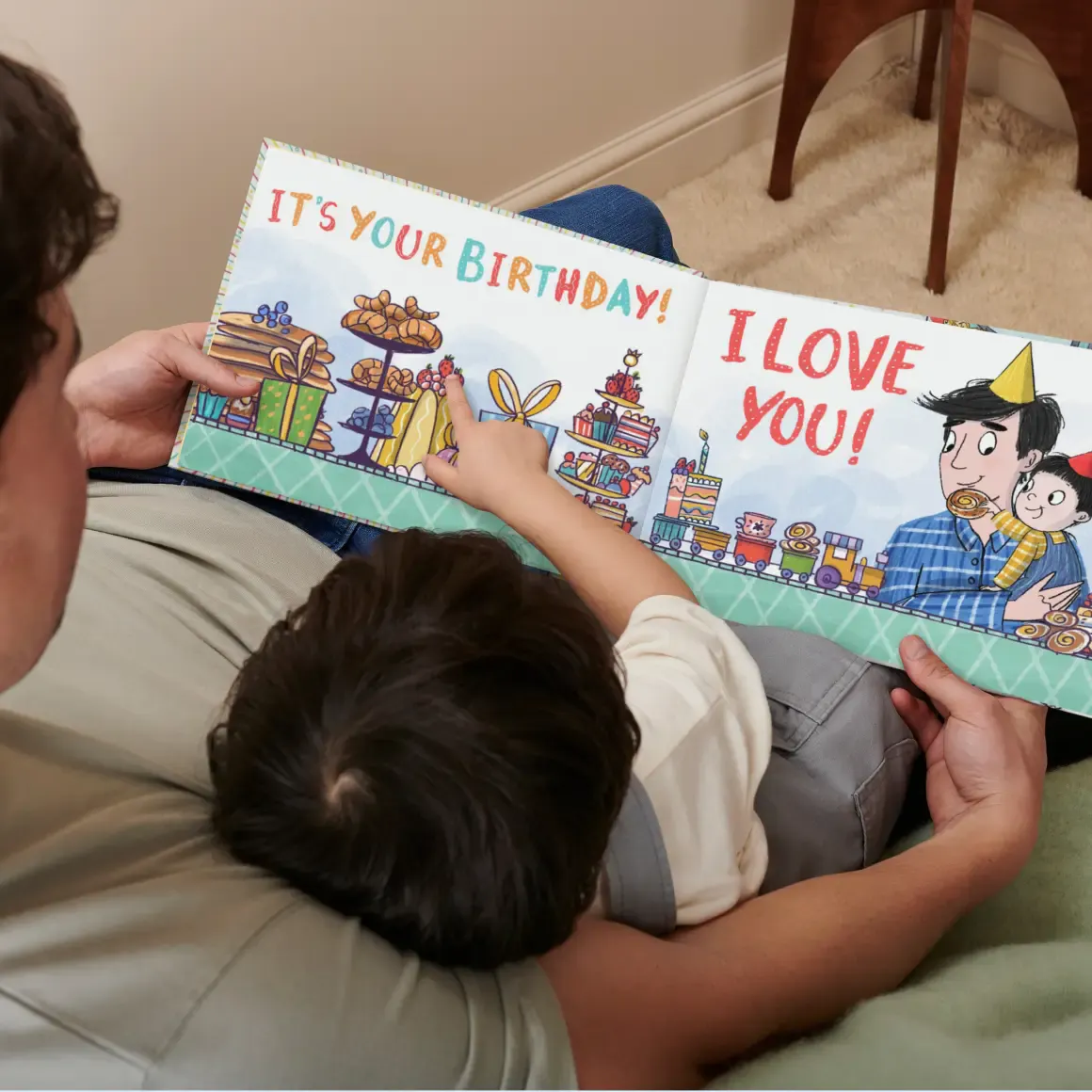 A father and son reading their personalised book