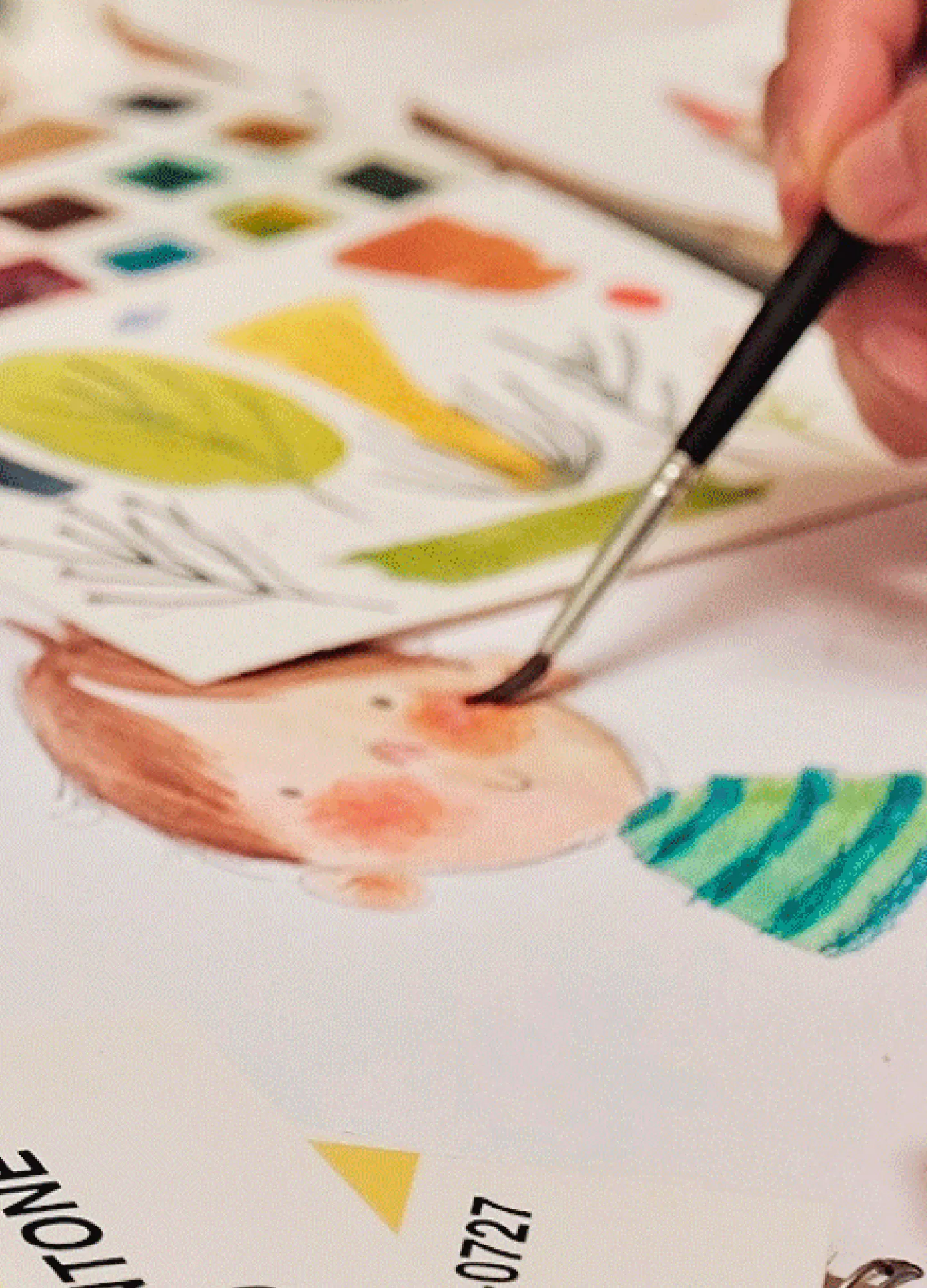 Artist painting a Wonderbly character