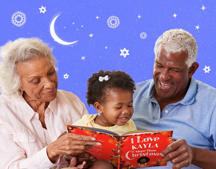 Grandparents and grandchild reading I Love You More Than Christmas