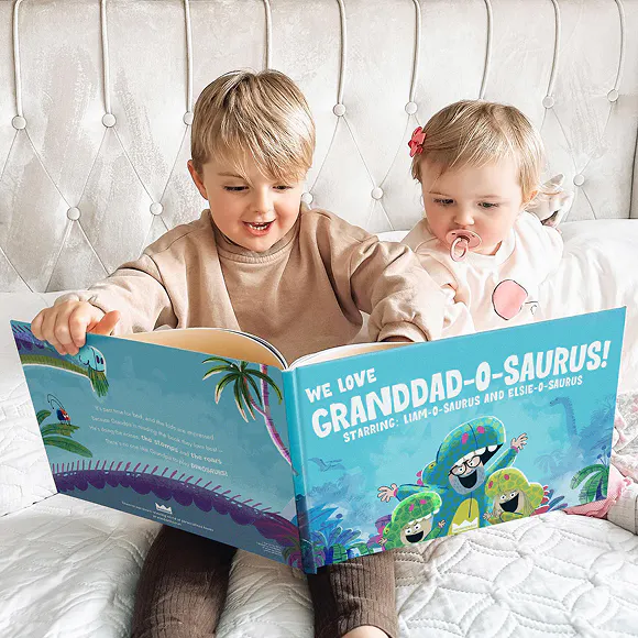 Two children reading the personalized book