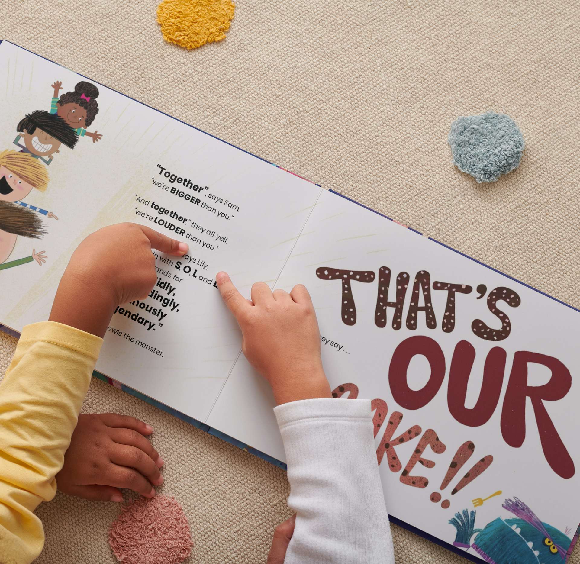 Two children reading the book together