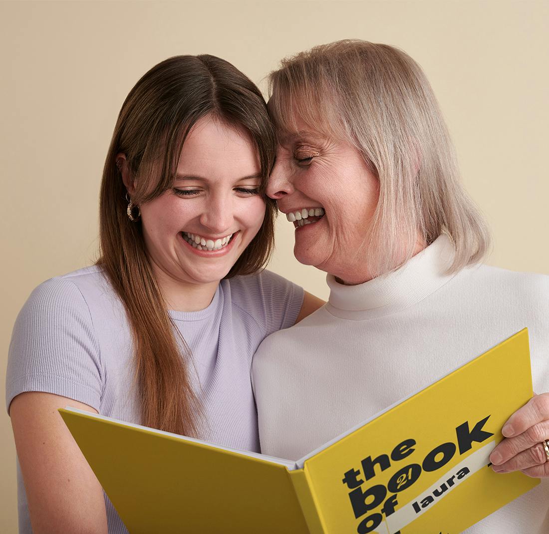 Mother and daughter with personalized book