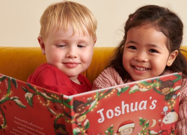 children reading Treasury of Nursery Rhymes