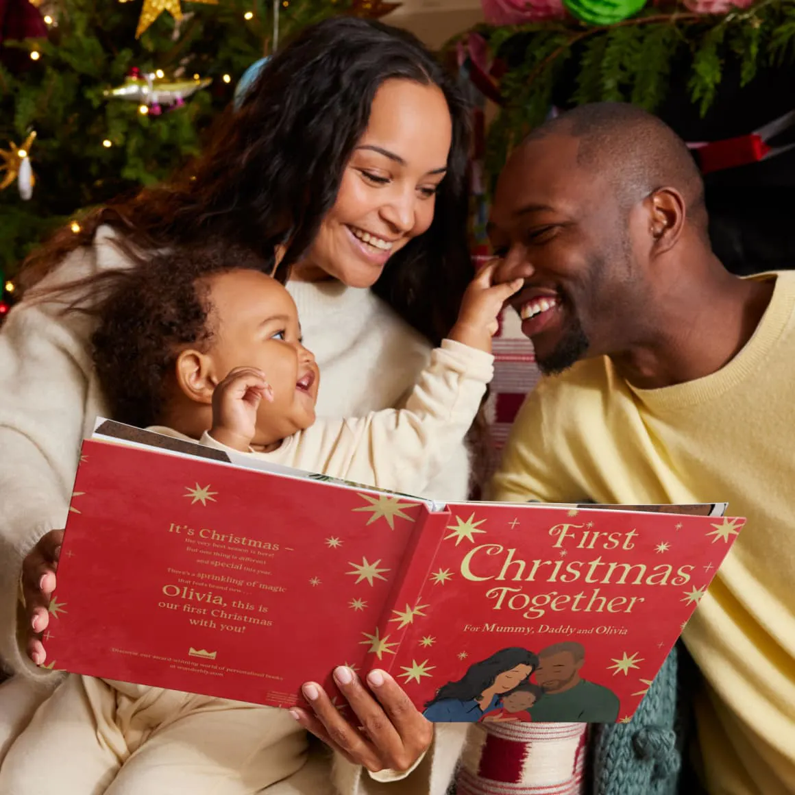 A child and their parents reading the personalised book