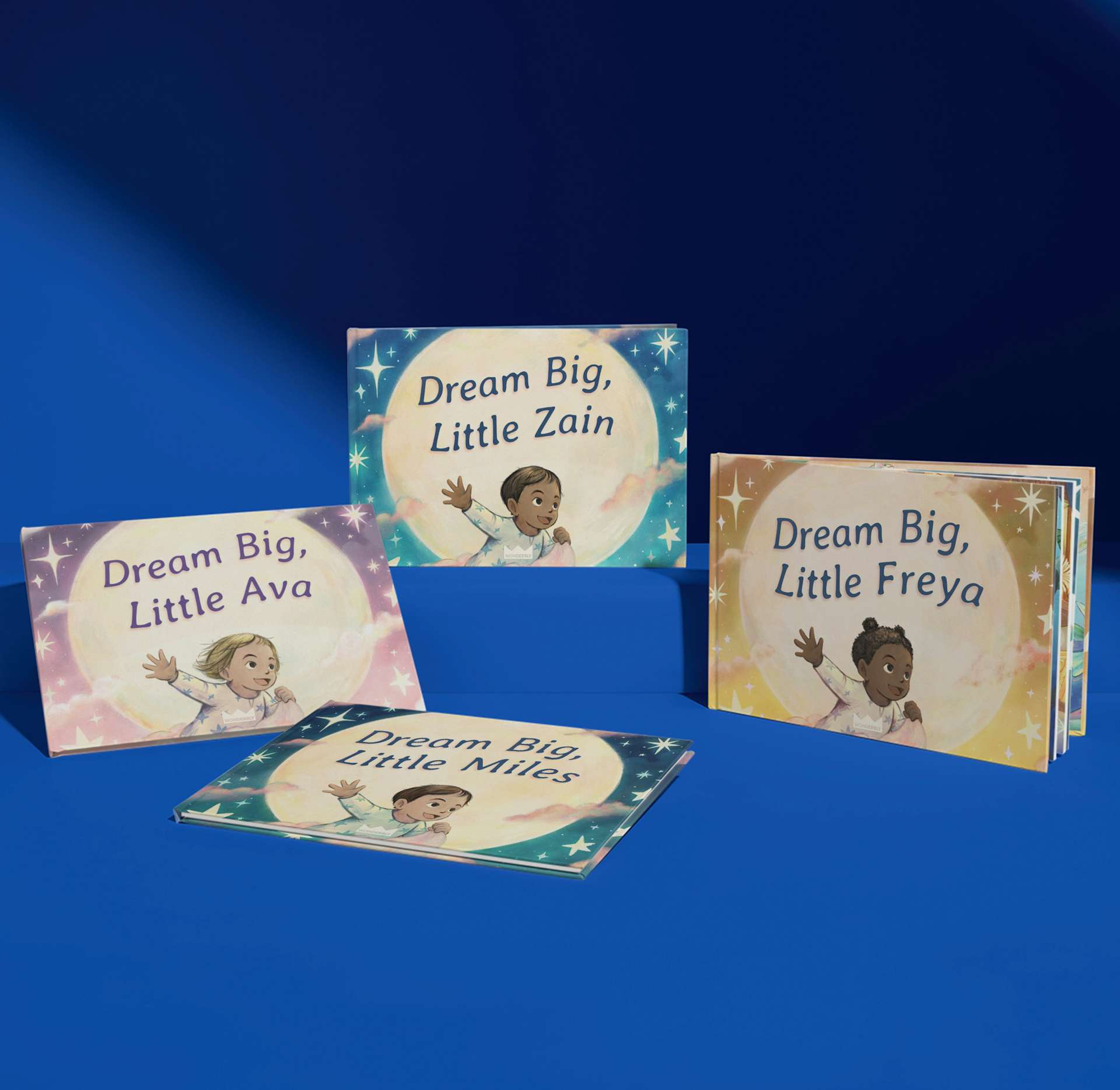 Four different coloured covers of Dream Big Little One