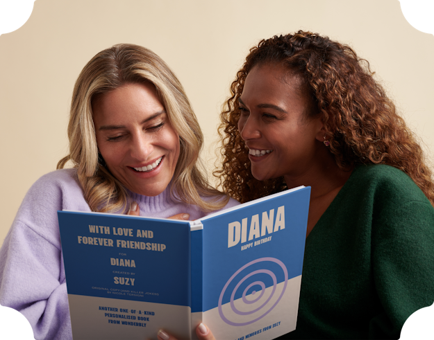 Two women reading their friendship book together