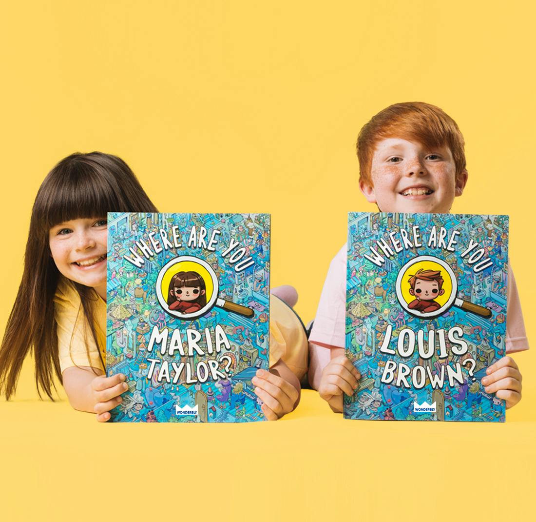 two kids holding their own personalised where are you book