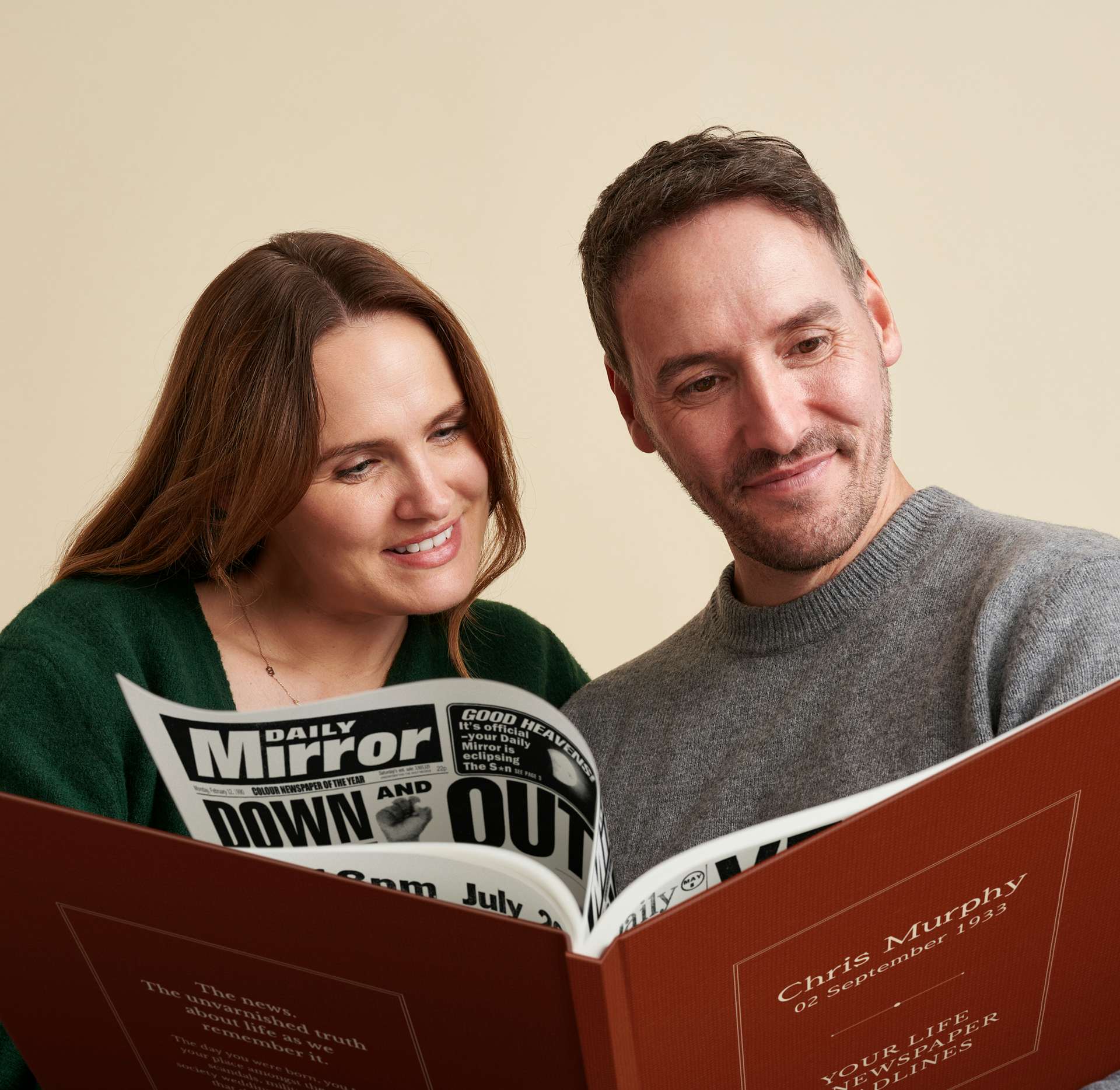 a couple reading personalised book