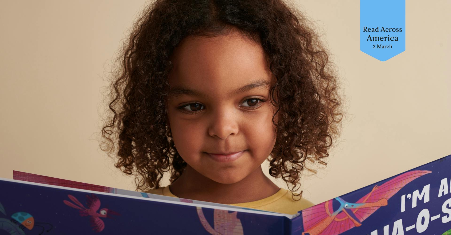 Read Across America in a bookmark shape with a kid reading a book
