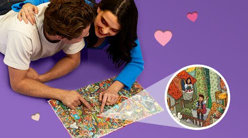 Couple reading copy of Super Epic Love Quest book