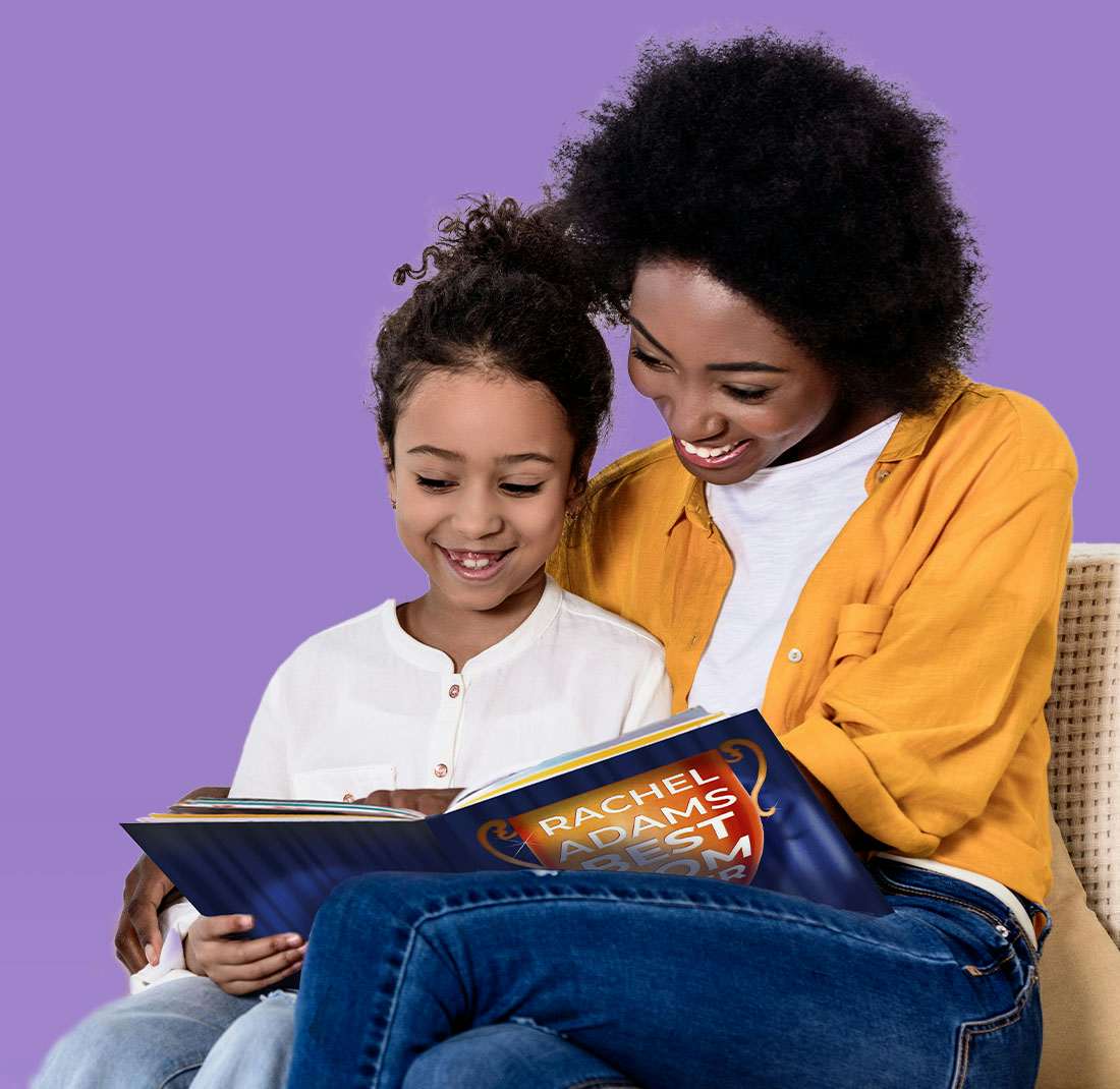 Mother and daughter reading the book together