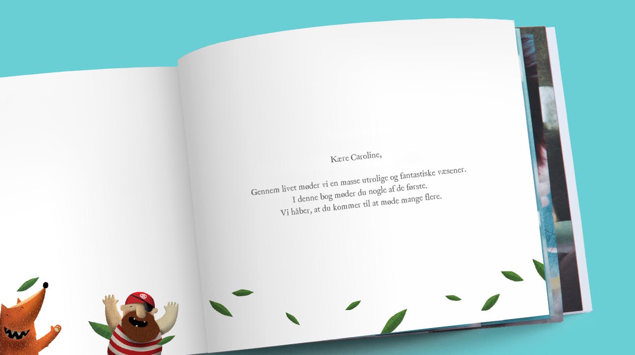 A picture of a custom dedication printed on the first page of the book in Danish