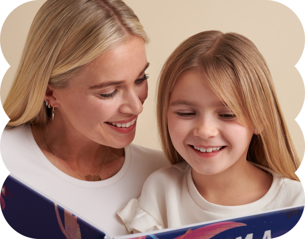 mum and child smiling reading book