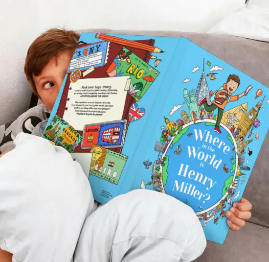 Child holding their personalised book