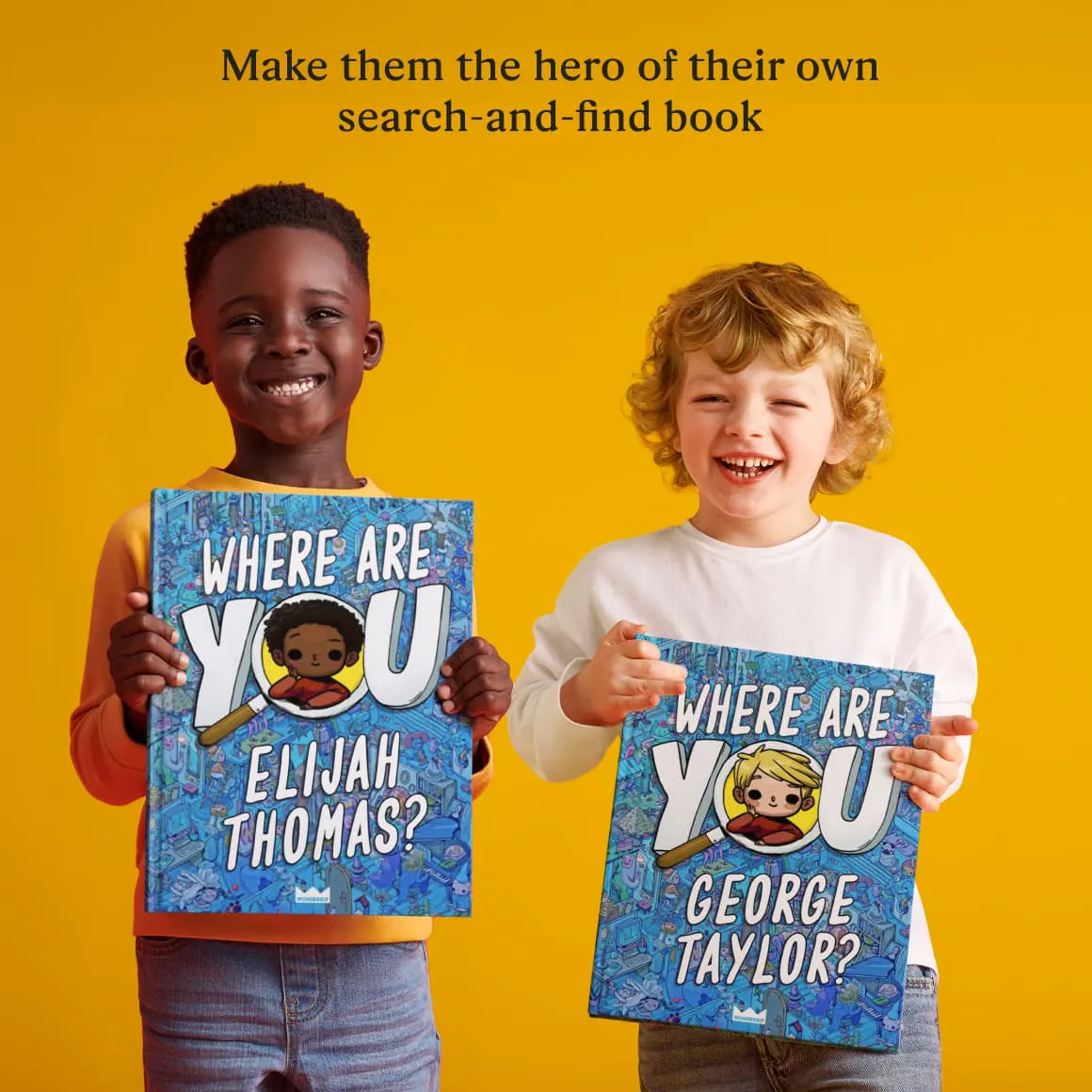two boys holding books with personalized covers