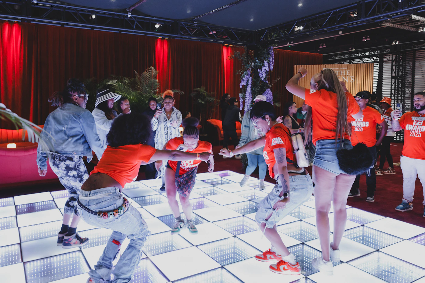 Fans actively engaging inside an immersive environment inspired by pop culture