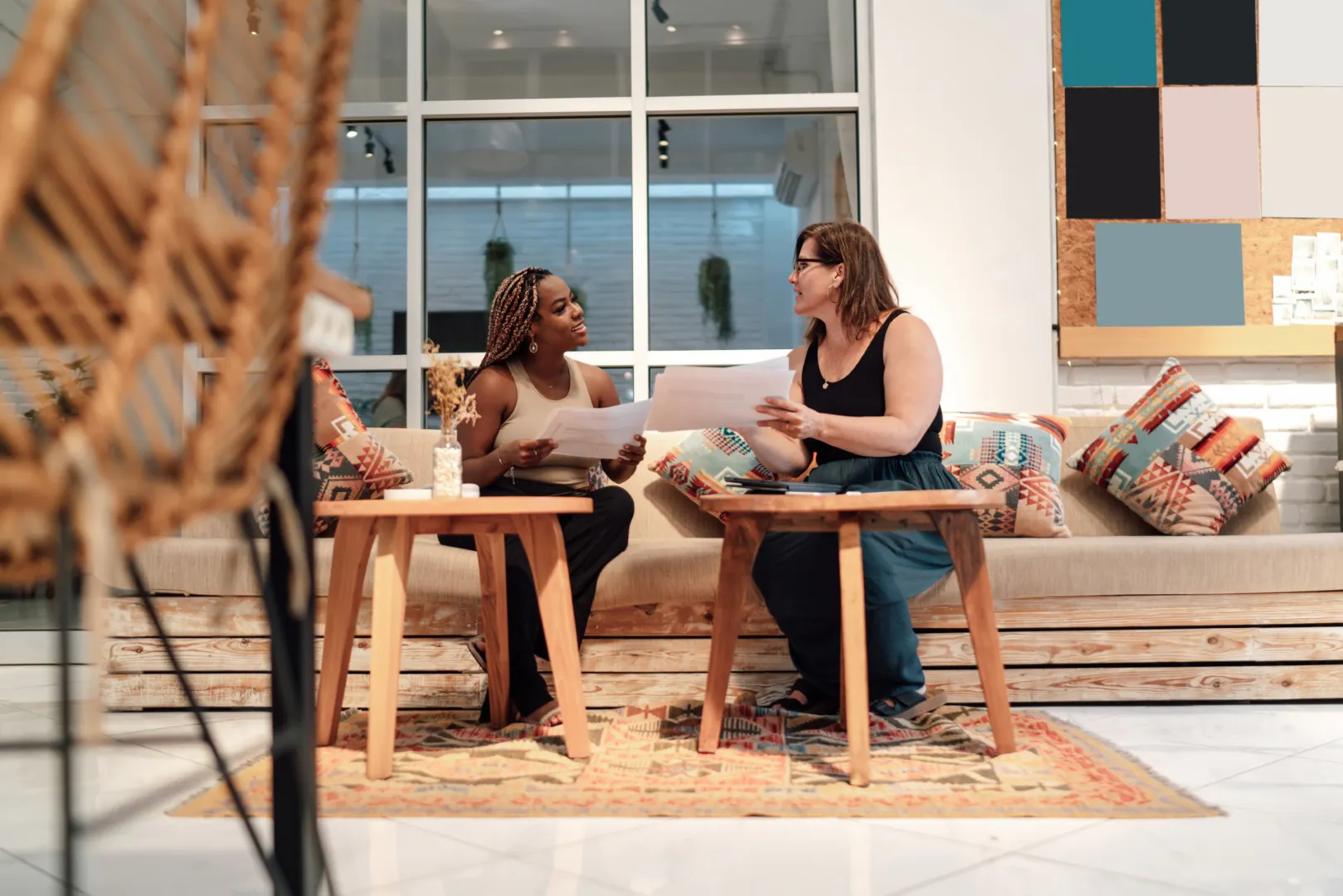 two creators working together within a shared space