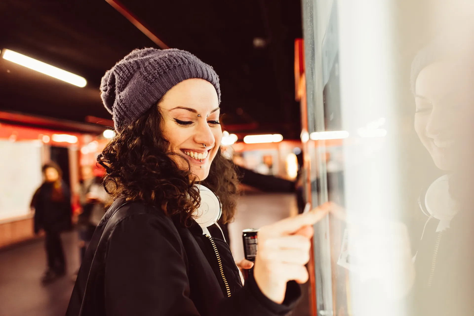 event atendee interacts with a wall element on an interactive AR experience