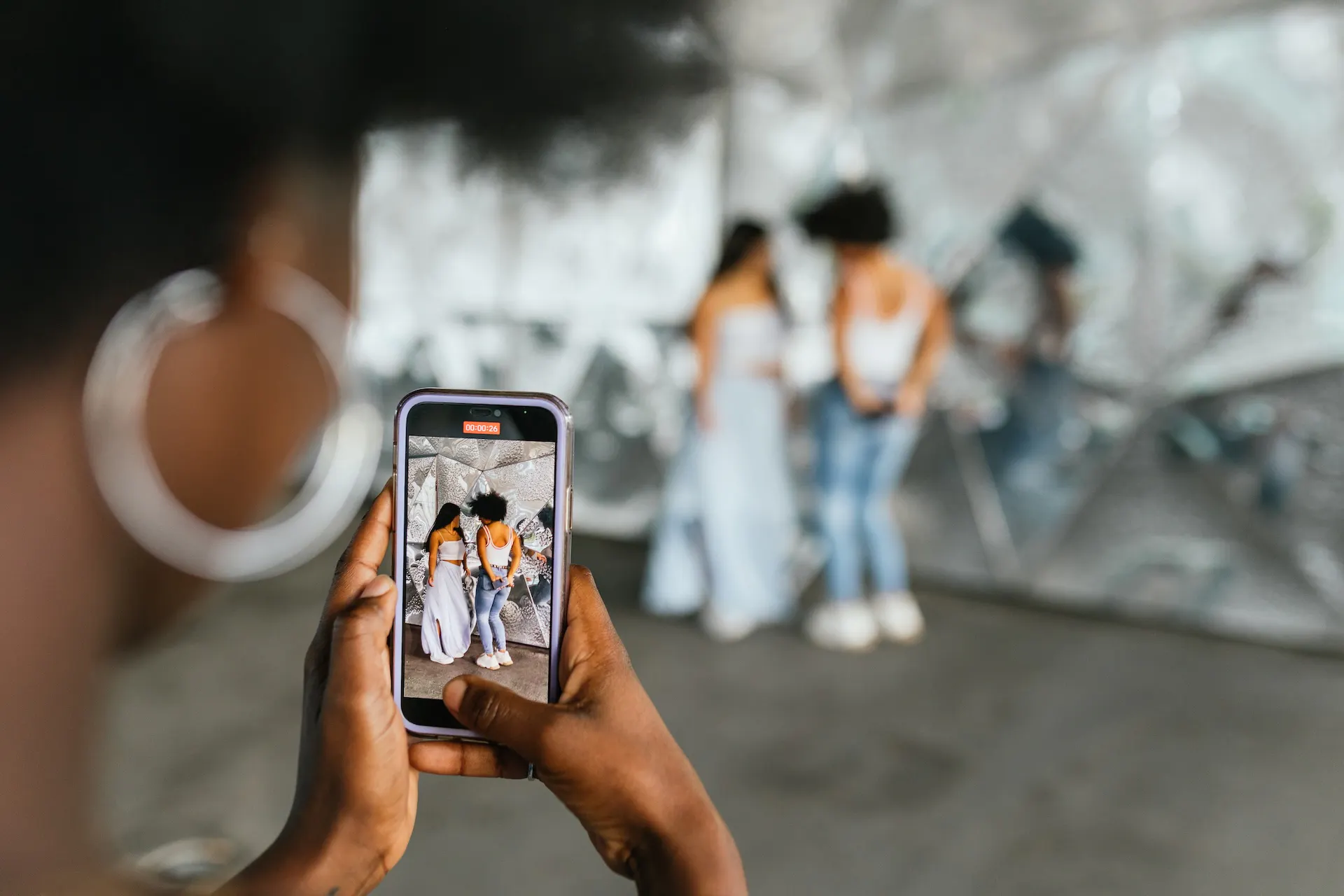 event atendees taking a group photo for social media share
