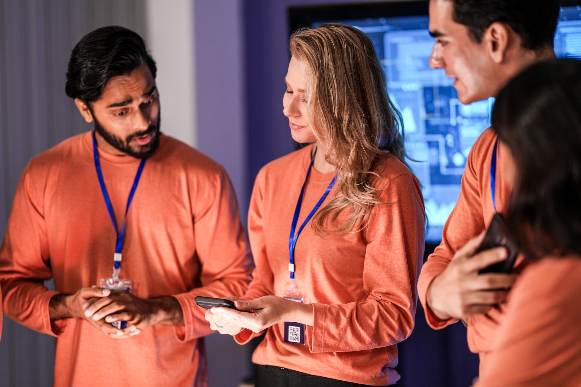 team members discussing with the leader during the event prep