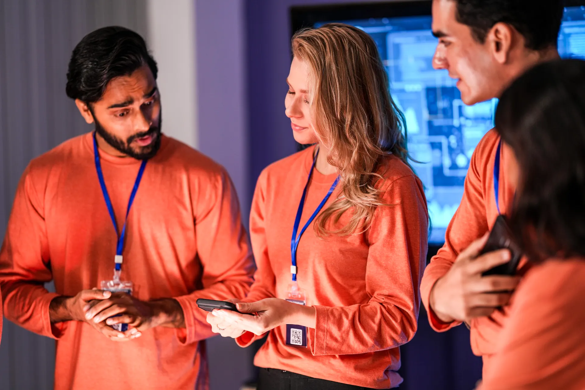 team members discussing with the leader during the event prep