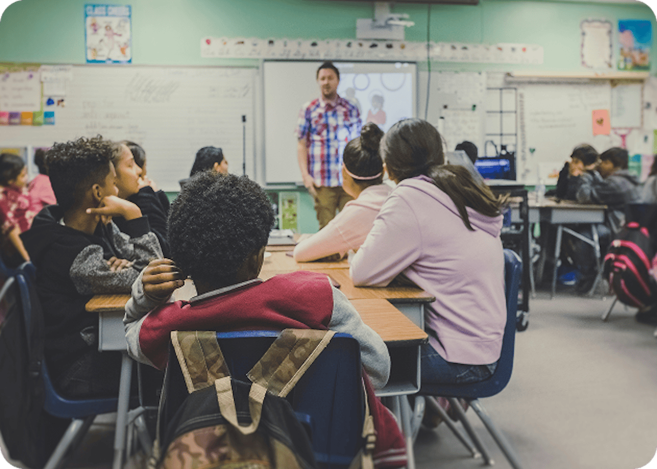 students and teachers in a classroom