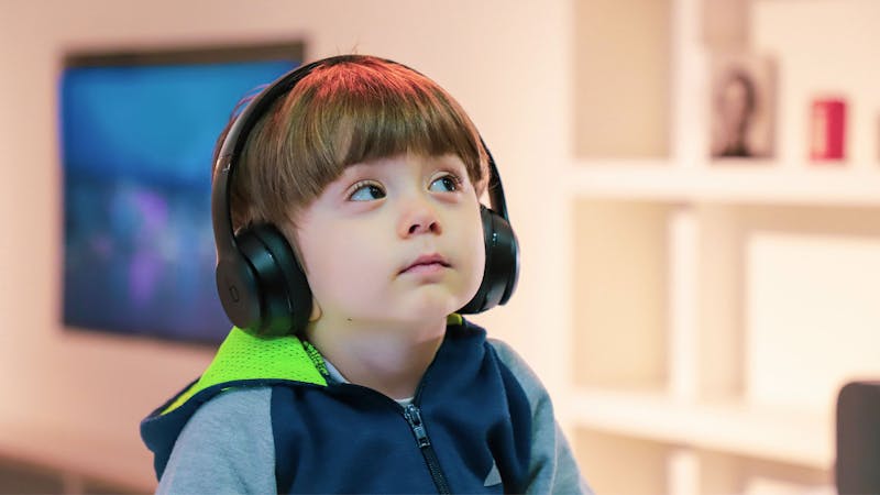 kid playing an inclusive video game