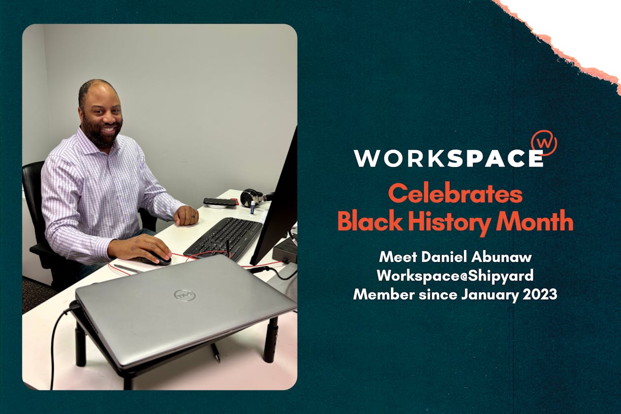 A picture of Workspace@Shipyard member, Daniel Abunaw sitting at his desk
