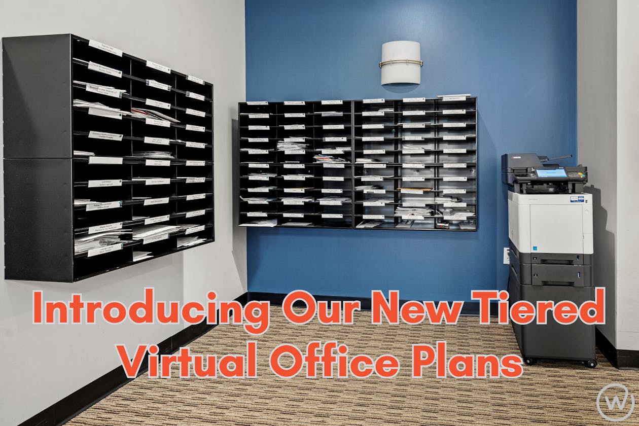 an image of mailbox shelves on the wall with a printer/copier machine next to them.