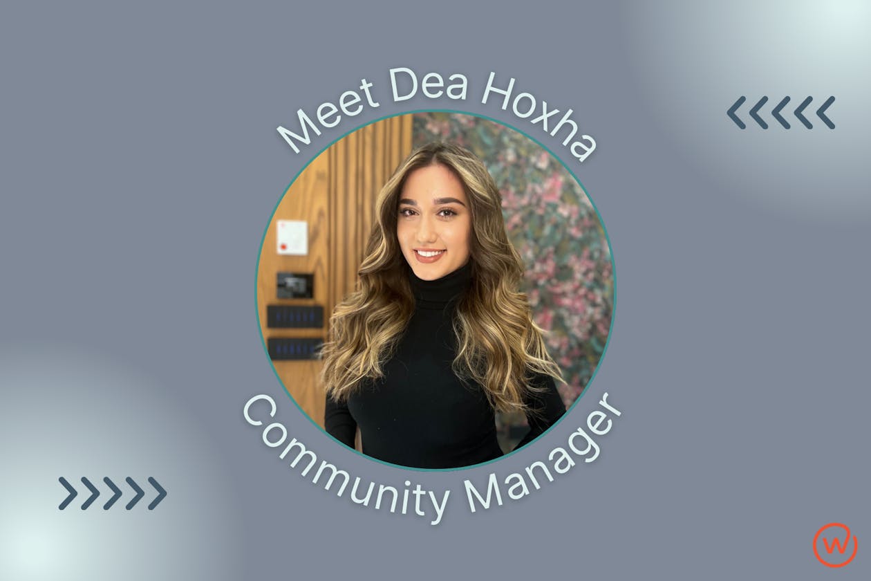 An image of the new Community Manager at Workspace Beverly, Dea Hoxha. She is in her twenties with long wavy hair, brown eyes, and a nice smile.
