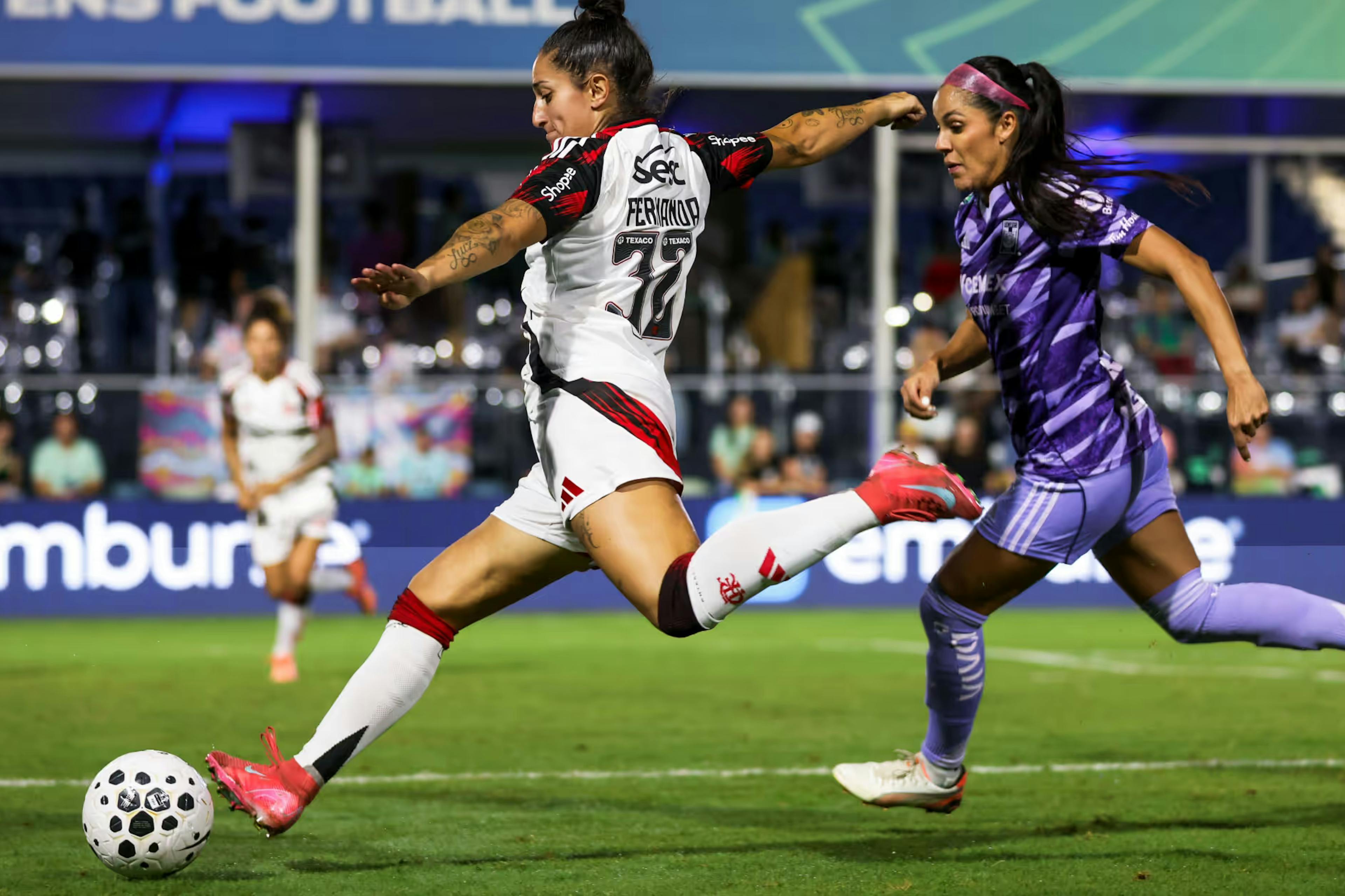 Player taking shot on goal in Flamengo vs Tigres football soccer match in fort lauderdale florida